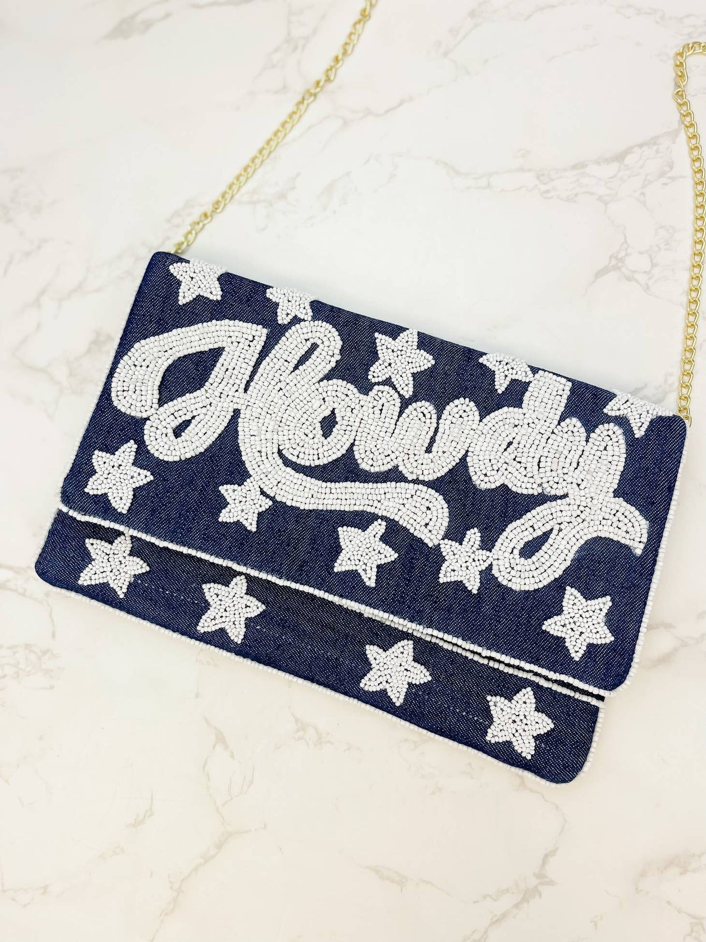 Howdy denim seed bead clutch